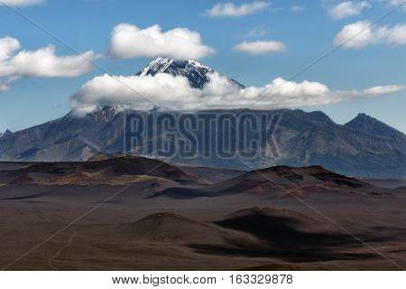 Kamchatka Peninsula Russian Far East: beautiful summer volcanic landscape - view of stratovolcano Bolshaya Udina Volcano in Klyuchevskaya Group of Volcanoes.