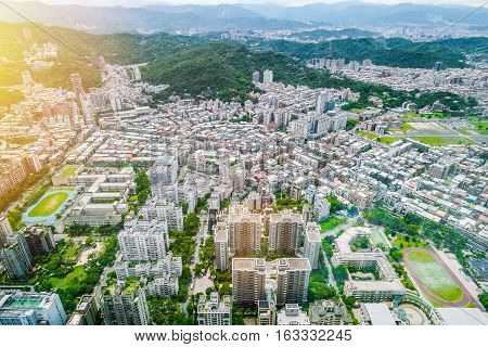 Business concept for real estate and corporate construction : panoramic modern city bird eye view with and morning cloudy blue sky from 101 building in Taipei Taiwan
