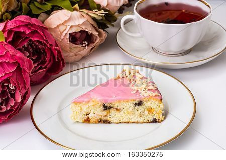 Cheesecake with dried fruits and glaze. Studio Photo