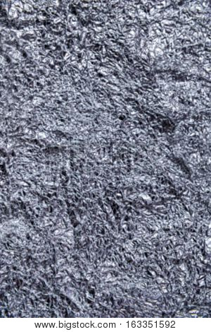 bsilver leaf foil as background or texture. blurred