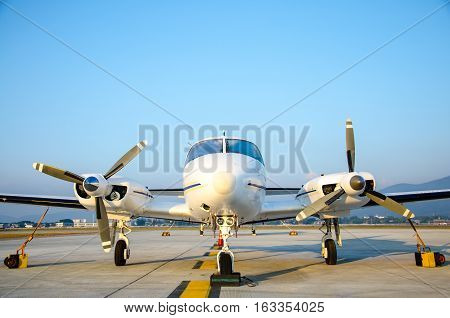 Close Up Front of Small Airplane or Aeroplane Parked at Airport.Small Airplane Famous to use Private Airplane.Mountain View.