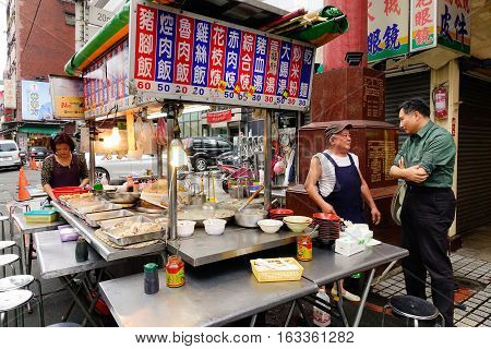 People Selling Foods On Street At Night