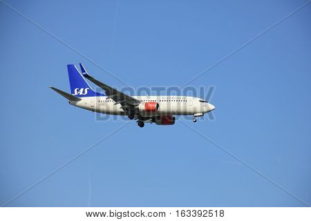 Amsterdam the Netherlands - May 6th 2016: SE-RJU SAS Scandinavian Airlines Boeing 737 approaching Schiphol Polderbaan runway arriving from Stockholm Sweden