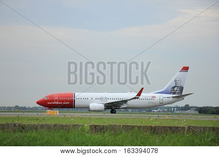 Amsterdam The Netherlands - August 9 2015: LN-NGP Norwegian Air Shuttle Boeing 737-800 taxing to the Polderbaan runway