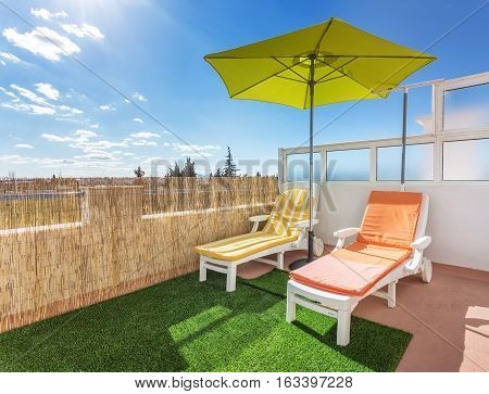 Cozy Corner on the terrace for sunbathing and relaxing. Summer for turists
