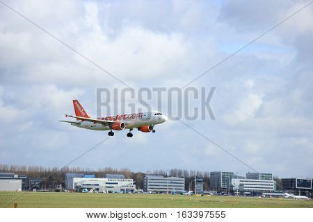 Amsterdam The Netherlands april 11 2015: G-EZWB easyJet Airbus A320-214 approaching runway 09-27 Buitenveldert