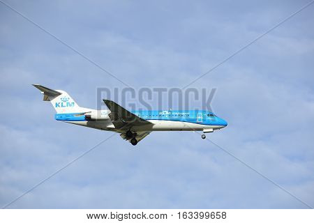 Amsterdam the Netherlands - July 15th 2016: PH-KZM KLM Cityhopper Fokker F70 approaching Polderbaan runway at Schiphol Amsterdam Airport arriving from Humberside United Kingdom