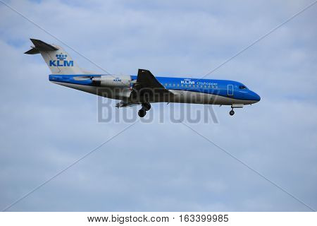 Amsterdam the Netherlands - July 15th 2016: PH-KZS KLM Cityhopper Fokker F70 approaching Polderbaan runway at Schiphol Amsterdam Airport arriving from Southampton United Kingdom