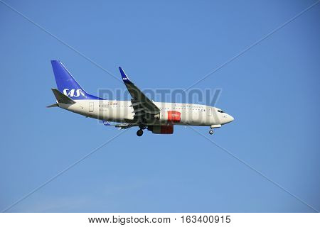 Amsterdam the Netherlands - May 6th 2016: SE-RJU SAS Scandinavian Airlines Boeing 737 approaching Schiphol Polderbaan runway arriving from Stockholm Sweden