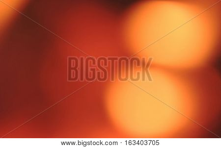 Bright orange lights orange spots of warm colors