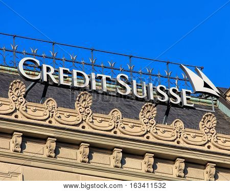 Zurich, Switzerland - 27 December, 2016: sign on the top of the Credit Suisse headquarter building on Paradeplatz square. Credit Suisse Group is a Swiss multinational financial services holding company, headquartered in Zurich.