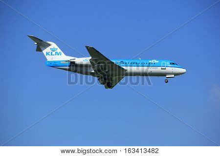 Amsterdam the Netherlands - June 24th 2016: PH-KZK KLM Cityhopper Fokker F70 approaching Polderbaan runway Amsterdam Schiphol arriving from London United Kingdom