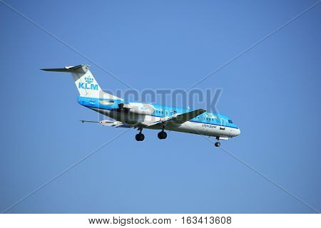 Amsterdam the Netherlands - June 24th 2016: PH-KZR KLM Cityhopper Fokker F70 approaching Polderbaan runway Amsterdam Schiphol arriving from Belfast Ireland