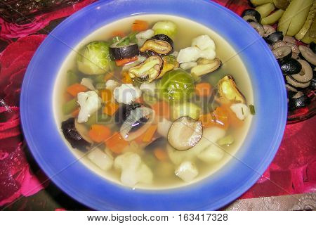 vegetable mussels soup with shellfish in dish