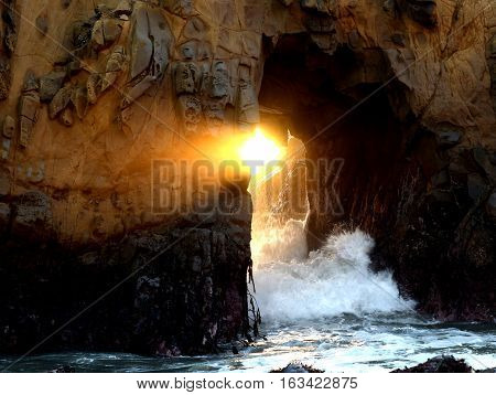 Big Sur Sunset seen from sea cave