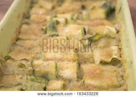 sliced zucchini au gratin grilled in oven