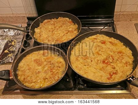 Pots With The Typical Dish Called Frico Of The Italian Region