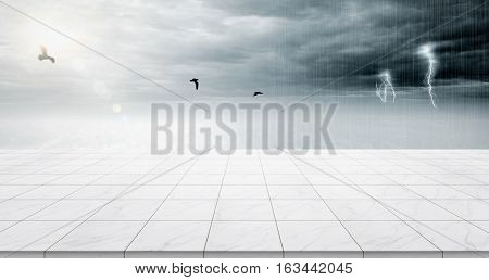 Business concept - Empty marble floor top with panoramic sky view under sunrise and storm thunder grey sky for display or montage product