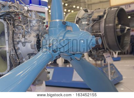 Screw parts and aircraft engine close-up. Industry