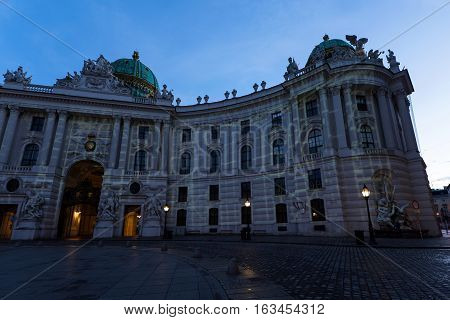 Famous hofburg palace in vienna in the evening, seen from michaelerplatz, austria