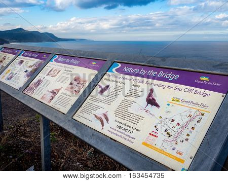 Illawarra Coastline, Australia - July 17, 2016: Signboard along the Illawarra Coastline, enroute to Wollongong, south of Sydney.