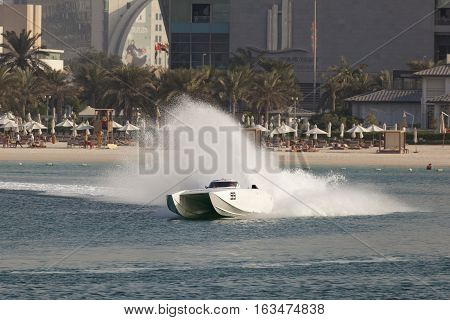 ABU DHABI UAE - NOV 24 2016: White racing boat at the Powerboat Championship 2016 in Abu Dhabi United Arab Emirates