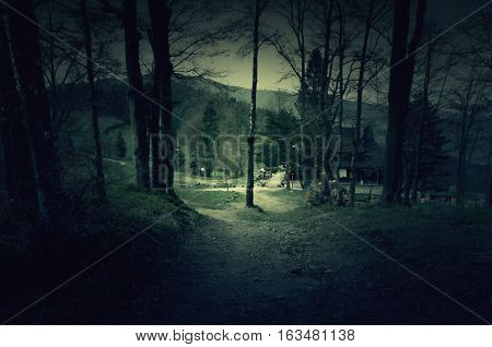 Creepy house in the middle of a dark forest