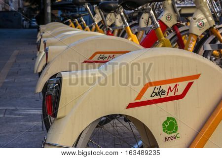 Bikemi Logo On A Rack Of Bike Sharing Bicycles In Milan Italy During Winter 2016