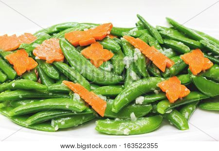 Fried Pea And Carot With Garlic On White, Vegetarion Healthy Food