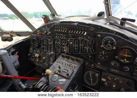 Inside the cockpit of the old plane. Vintage airplane dashboard, close up view