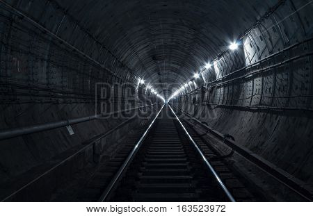 Underground tunnel. Railway in a subway tunnel