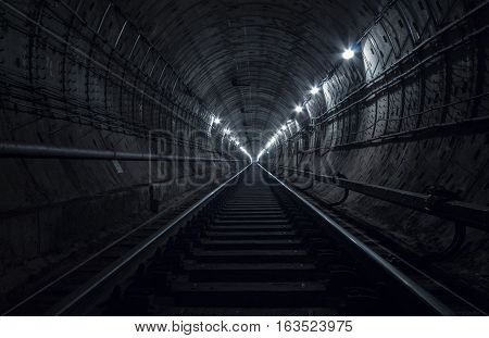 Underground tunnel. Railway in a subway tunnel