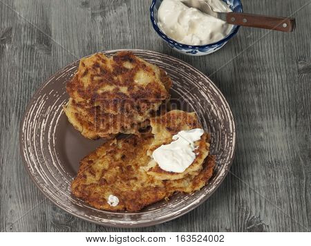 Marrow zuccini flapjack on timber board close up