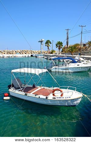 KALYVES, CRETE - SEPTEMBER 16, 2016 - Small boats moored in the harbour Kalyves Crete Greece Europe, September 16, 2016.