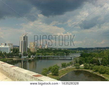 Landscape of the river Kalmius in Donetsk, a town in the background