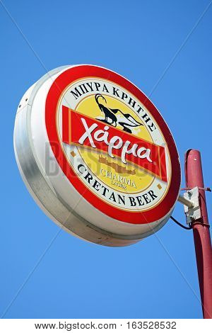 KALYVES, CRETE - SEPTEMBER 16, 2016 - Charma Cretan beer sign against a blue sky Kalyves Crete Greece Europe, September 16, 2016.