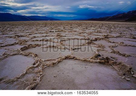 Mojave Desert background - dried cracked mud in Death Valley National Park California USA