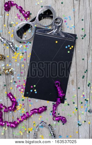 Carnival Confetti On Wood Background