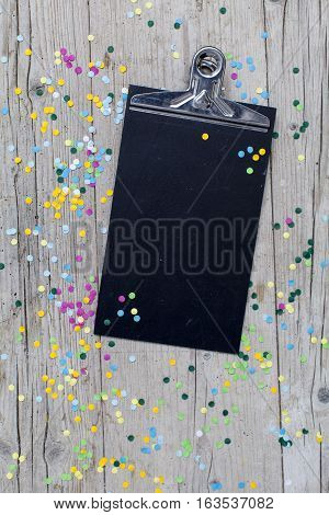 Carnival Confetti On Wood Background
