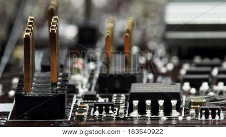 Integrated Semiconductor Microchip Microprocessor On Blue Circuit Board Representative Of The High T