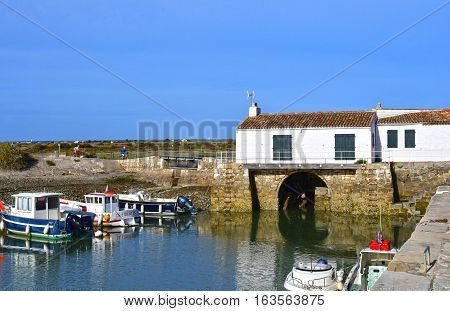 Loix France - september 26 2016 : the picturesque water mill in autumn