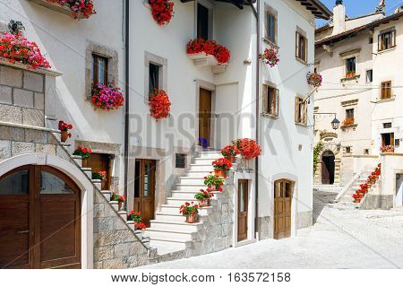 Pescocostanzo, Italy - September 3, 2006:  Traditional architectures with floral decorations of the country center