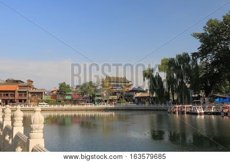 BEIJING CHINA - OCTOBER 26, 2016: Unidentified people visit Houhai lake Futong street.