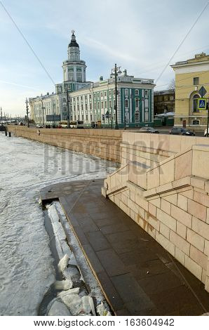 The granite embankment along the riverwhich is icebound.