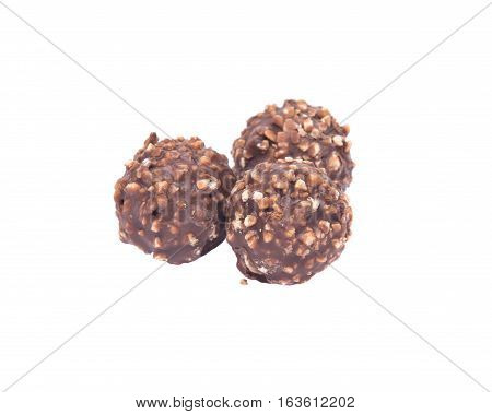 Luxury round chocolate pralines isolated on white background