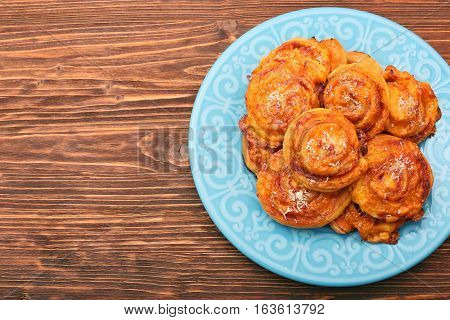 Puff pastry rolls with ham and cheese. Food for parties. Snack.