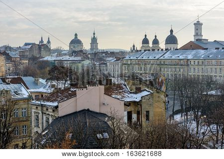 Winter Day in Lviv. View of the central part of the city and churches: St. Michael's Ukrainian Catholic Church Church of the Holy Communion Korniakt Tower Armenian cathedral Transfiguration Church Lviv city council.