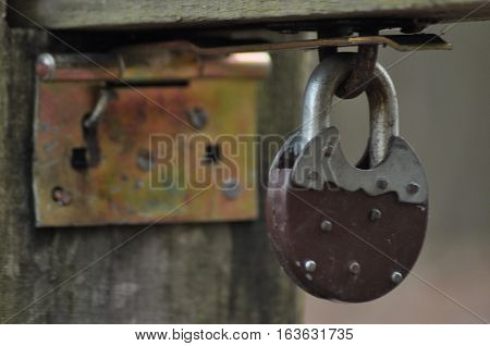 Old closed padlock. Banned. Lock entrence, way.