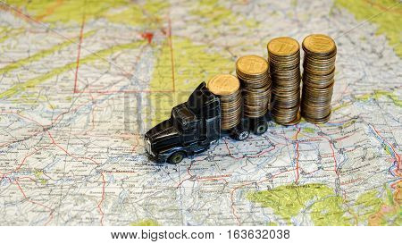 Toy truck full of coins. Financial news Bank loans Finance and money savings.