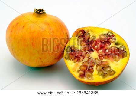 Pomegrenate fruit isolated on a white background